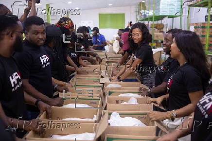 Boxes of supplies are distributed to the poor in Lagos