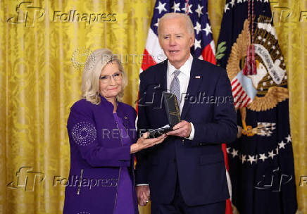 U.S President Biden gives the Presidential Citizens Medal, one of the country's highest civilian honors, during a ceremony at the White House in Washington