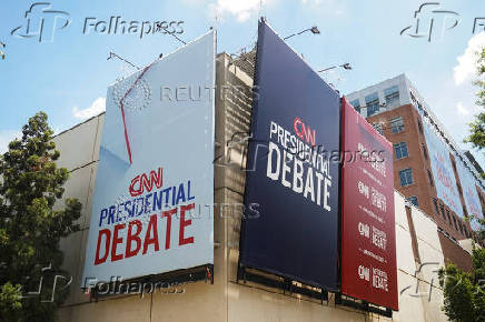 FILE PHOTO: Signs promoting the debate between U.S. President Joe Biden and his rival Donald Trump in Atlanta