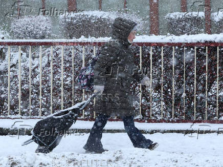 People are sledging in Aviemore, Scotland,