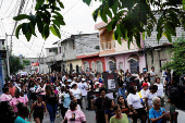 Families of four boys found dead hold vigil, in Guayaquil