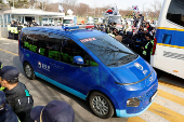 Scenes from outside the Seoul Detention Center in Uiwang