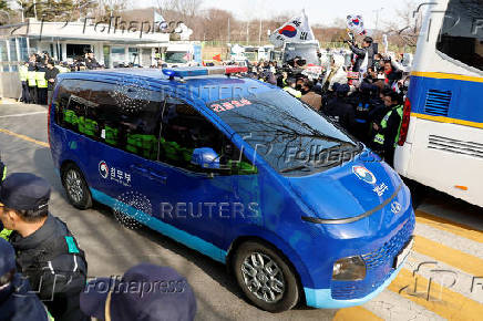 Scenes from outside the Seoul Detention Center in Uiwang