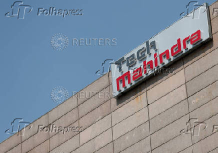 FILE PHOTO: Tech Mahindra logo is seen on its office building in Noida