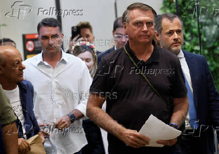 Brazil's former President Jair Bolsonaro arrives at Brasilia International Airport