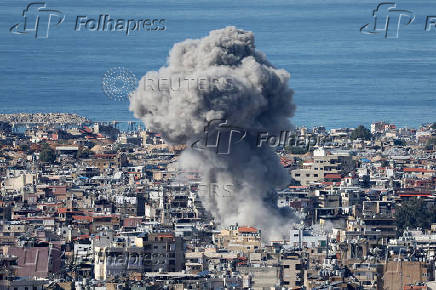 Smoke billows in Beirut's southern suburbs, after an Israeli strike