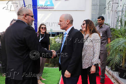 Yaniv Mizrahi, CEO of HELA Systems, shakes hand with Reuven Azar, Israeli ambassador to India, during the inauguration ceremony of HELA Systems in Hyderabad