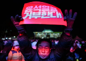 Protesters take part in a rally calling for the impeachment of South Korean President Yeol, in Seoul