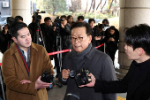 Seok Dong-hyeon, a lawyer for South Korea's impeached President Yoon Suk Yeol, arrives at a court, in Seoul