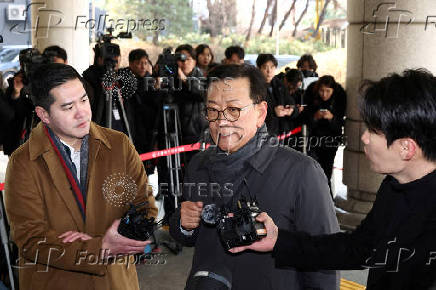 Seok Dong-hyeon, a lawyer for South Korea's impeached President Yoon Suk Yeol, arrives at a court, in Seoul