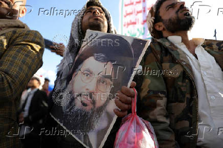 Protesters show support to Lebanon?s Hezbollah and Palestinians in the Gaza Strip, in Sanaa