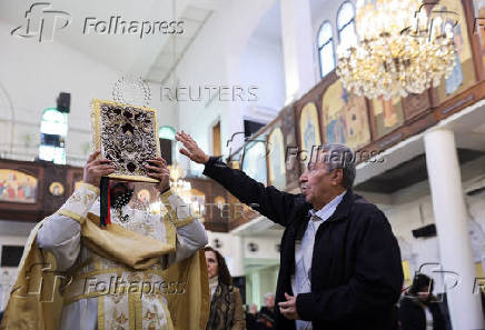 Faithful celebrate Christmas, following the ousting of Syria's Bashar al-Assad, in Damascus