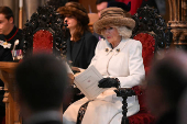 FILE PHOTO: Queen Camilla deputises for King Charles III at annual presentation of 'Maundy money' to community workers