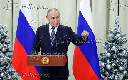 Russian President Putin attends a press conference in Leningrad region