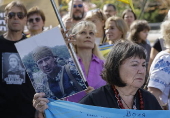 Ukrainians take part in procession for the 'Day of Defenders of Ukraine' in Kyiv