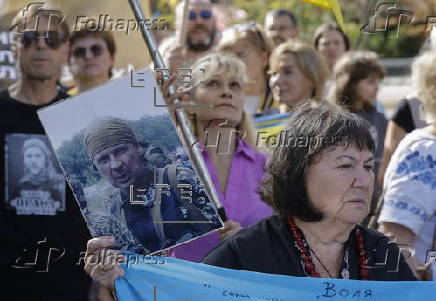 Ukrainians take part in procession for the 'Day of Defenders of Ukraine' in Kyiv