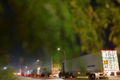 Trucks queue to cross into the United States at Zaragoza-Ysleta border crossing