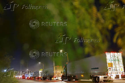 Trucks queue to cross into the United States at Zaragoza-Ysleta border crossing