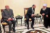 Lebanese Druze leader Walid Jumblatt meets with Syrian caretaker Prime Minister Mohammed al-Bashir in Damascus