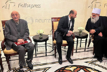 Lebanese Druze leader Walid Jumblatt meets with Syrian caretaker Prime Minister Mohammed al-Bashir in Damascus