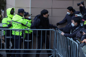 Pro-Yoon protesters participate in a rally outside a court, in Seoul