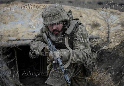 Ukrainian servicemen attend a training near the town of Siversk