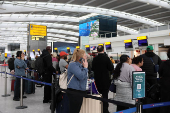 Scenes from Heathrow airport, after a fire at a nearby electrical substation wiped out the power at the airport