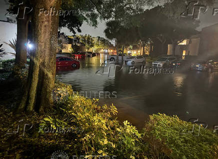 A residential street is flooded as Hurricane Helene moves through Florida