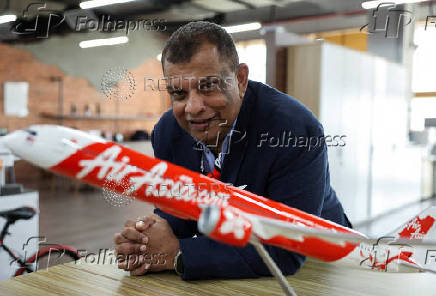 FILE PHOTO: Tony Fernandes, the CEO of AirAsia's parent company, Capital A, attends an interview with Reuters in Sepang