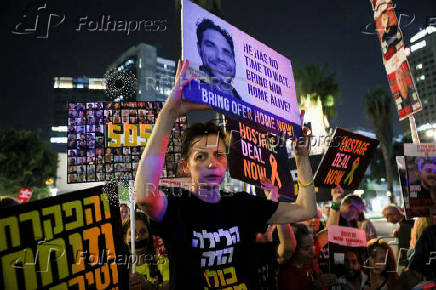 Protesters rally calling for the immediate release of Israeli hostages held in Gaza, in Tel Aviv