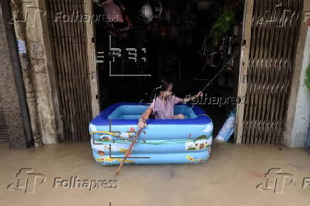 Red River overflows causing severe flooding in Hanoi following Typhoon Yagi