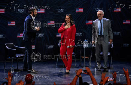 Robert F. Kennedy Jr. and Tulsi Gabbard take part in a moderated discussion with actor Zachary Levi in Dearborn