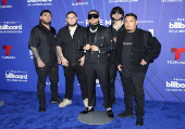 El negro y los diseos clsicos intervenidos dominaron la alfombra de los Latin Billboards