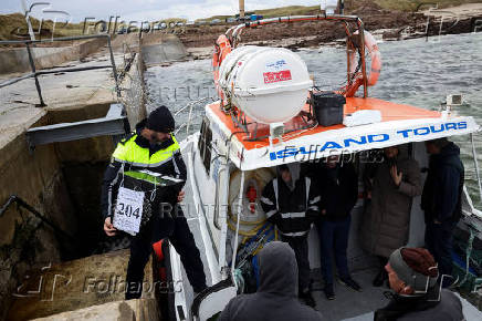 People vote in Ireland's general election, on the island of Gola