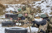 Ukrainian civilians undergo basic military training in Kharkiv