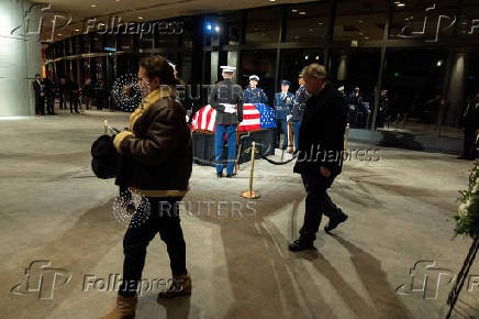 Mourners depart after viewing the casket of former President Jimmy Carter as he lies in repose at the Jimmy Carter Presidential Library and Museum in Atlanta