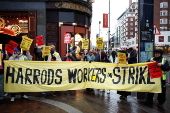 Harrods staff strike for Christmas bonus and better conditions.