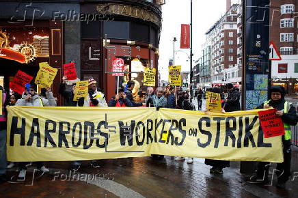 Harrods staff strike for Christmas bonus and better conditions.