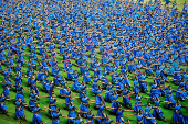 Participants wearing colourful attire, perform Bharatanatyam dance at the Jawaharlal Nehru International Stadium, in Kochi