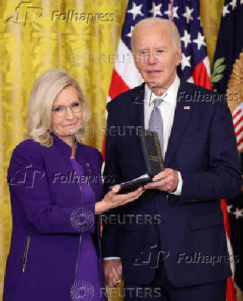 U.S President Biden gives the Presidential Citizens Medal, one of the country's highest civilian honors, during a ceremony at the White House in Washington