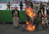 Houthi supporters protest againt the US and Israel in Sana'a