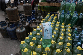 Containers filled with fuel sold on the black market in Damascus