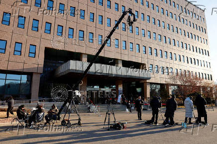 Members of the media await the arrival of Impeached South Korean President Yoon Suk Yeol at the Corruption Investigation Office for High-ranking Officials in Gwacheon