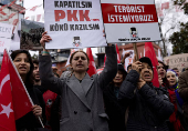 Demonstrators gather to protest talks to seek an end to a 40-year conflict between the PKK and Turkish state in Istanbul