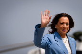 U.S. Democratic presidential nominee Kamala Harris walks to board Air Force Two at Joint Base Andrews in Maryland