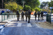 Israeli soldiers patrol in Kiryat Shmona