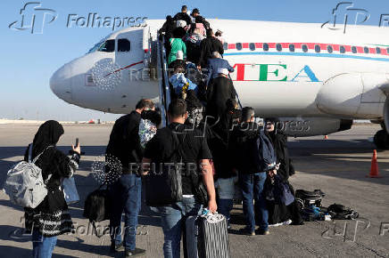 Displaced Lebanese, who had fled to Iraq, prepare to head back home after a ceasefire between Israel and Hezbollah took effect, in Najaf