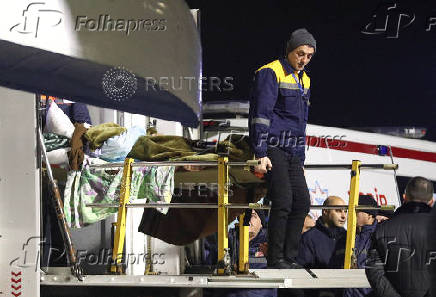 Survivors of Azerbaijan Airlines' passenger plane crash arrive in Baku