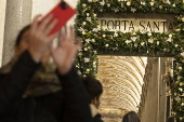 People walk through the Holy Door at Rome's Basilica of Saint Mary Major