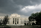 FILE PHOTO: Storm clouds gather over U.S. Federal Reserve Building before evening thunderstorm in Washington